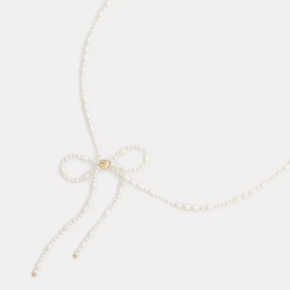 Collar gargantilla con lazo de perlas