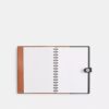 Cuaderno Disney X Coach de piel regenerativa con Mickey Mouse