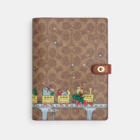 Cuaderno en Signature Canvas con motivo de tren navideño