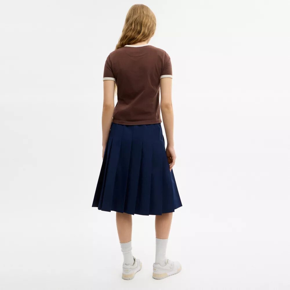 Falda midi plisada de estilo deportivo