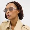 Gafas de sol ovaladas estrechas con herrajes metálicos