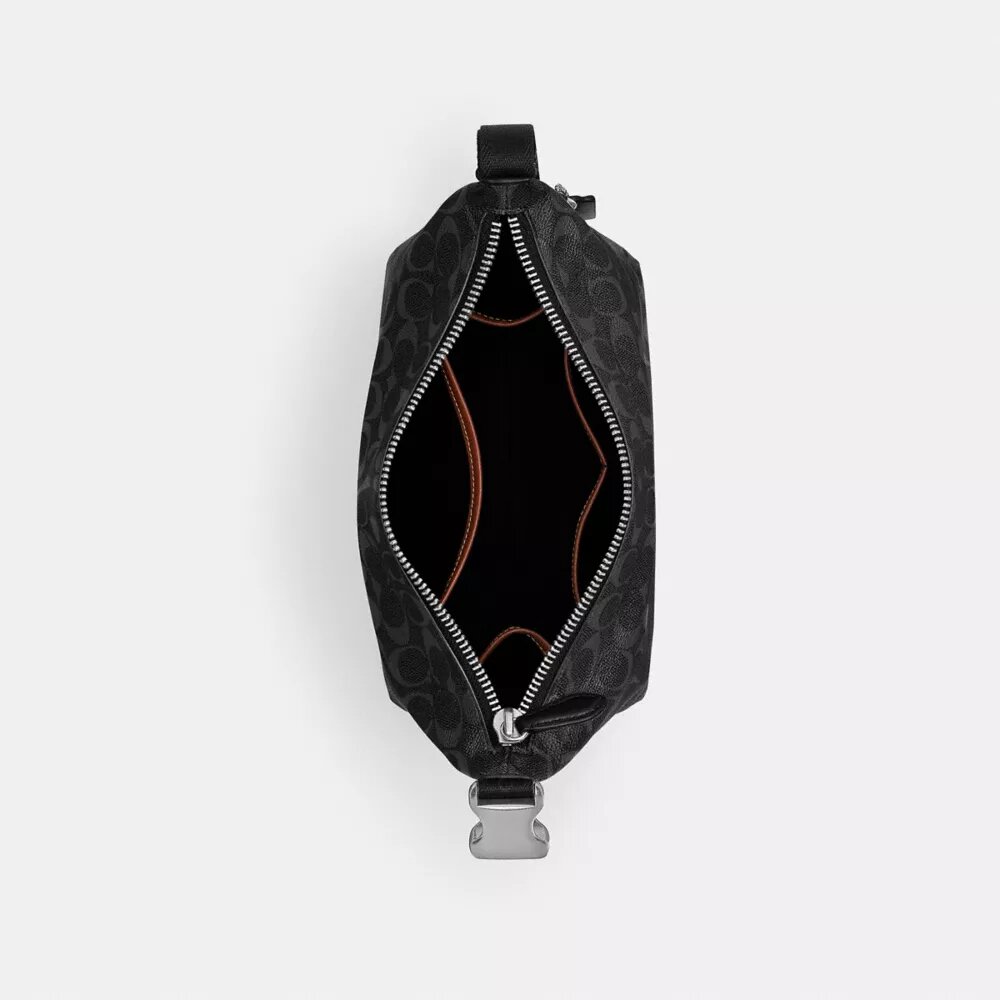 Kit de viaje con cierre Speedclip en Signature Canvas