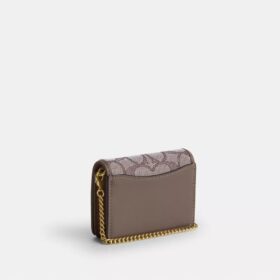 Mini cartera con cadena en jacquard exclusivo con bordado floral