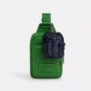 Mini colgante para mochila Warner en Signature Canvas