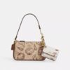 Mini colgantes para bolsos Klare con estampado de conchas
