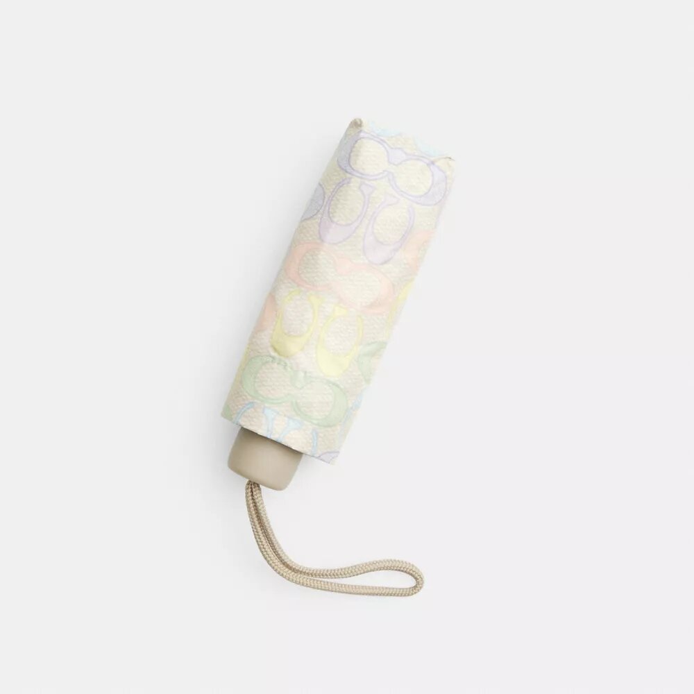 Mini paraguas con protección UV y estampado «Rainbow Signature»