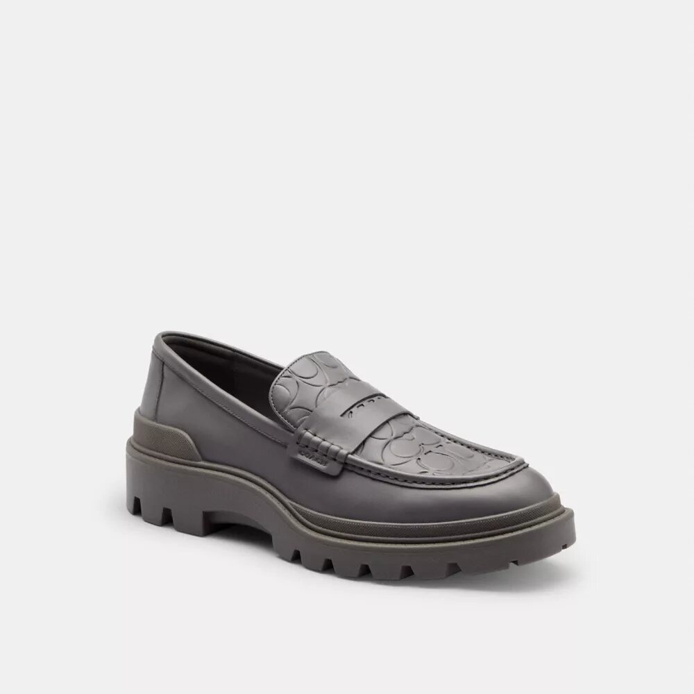 Mocasines con estampado emblemático