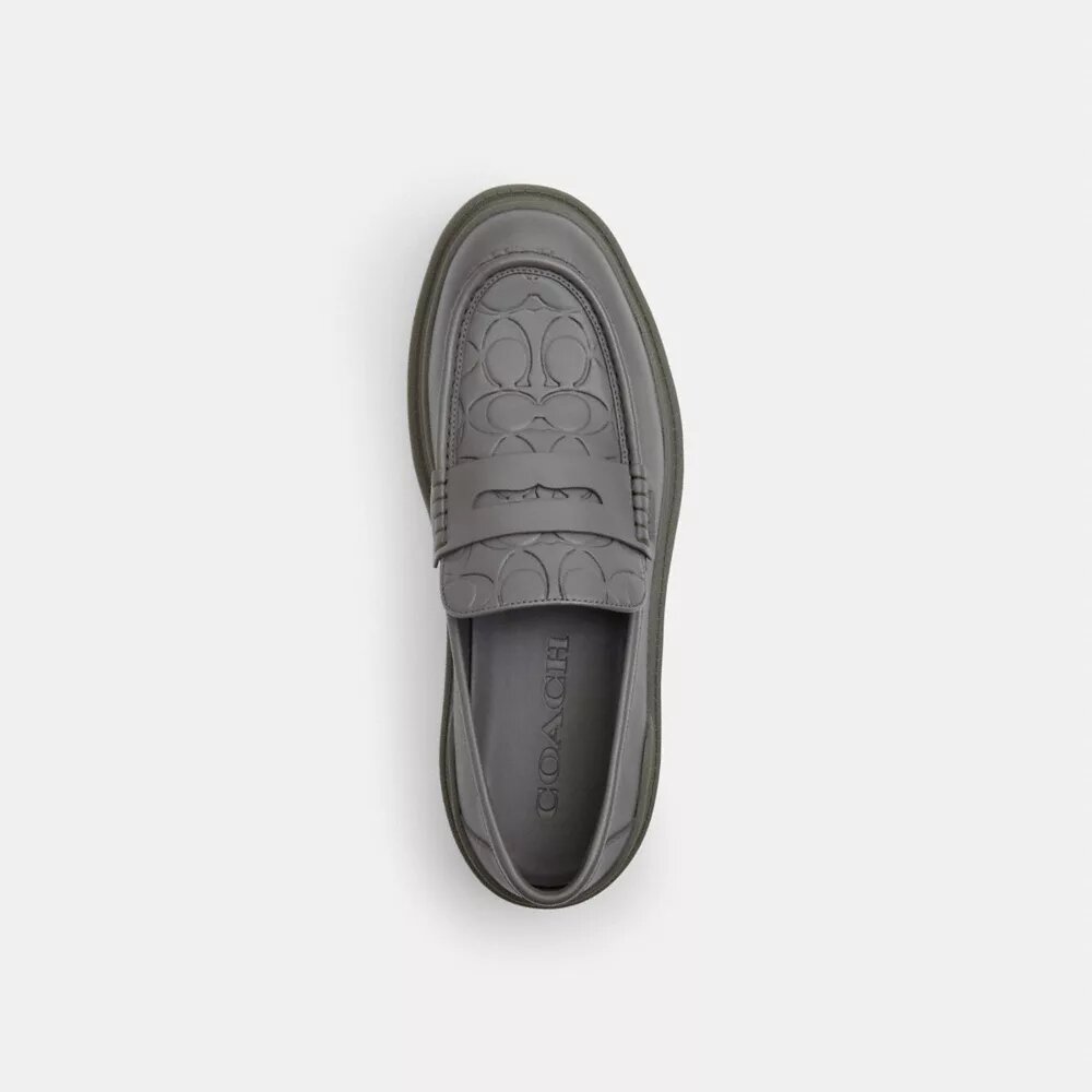 Mocasines con estampado emblemático