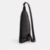 Mochila bandolera Dominic en Signature Canvas