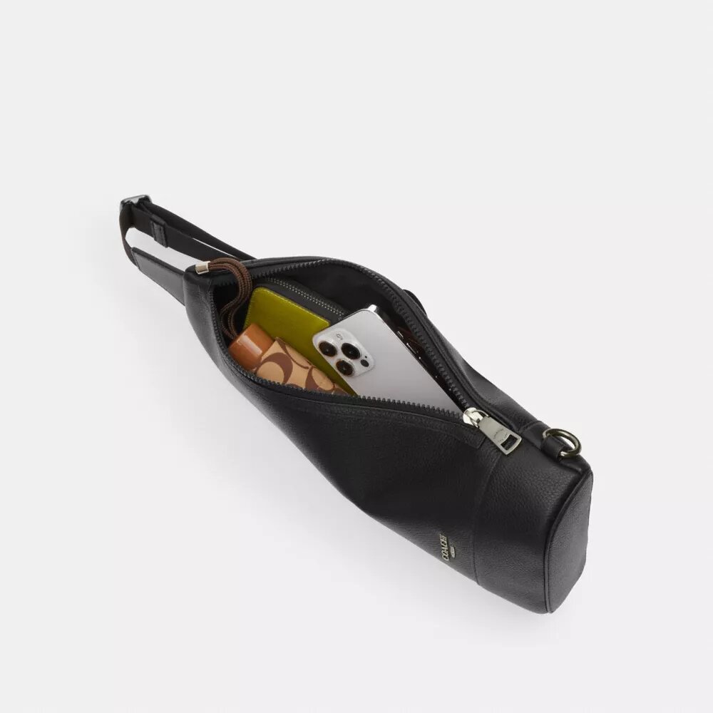 Mochila bandolera Dominic en Signature Canvas