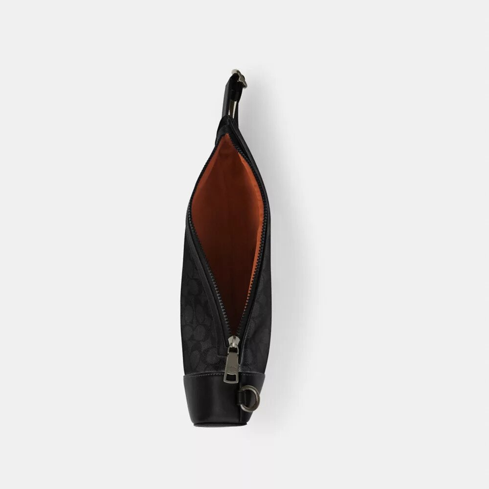 Mochila bandolera Dominic en Signature Canvas