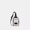 Mochila bandolera Racer en Signature Canvas