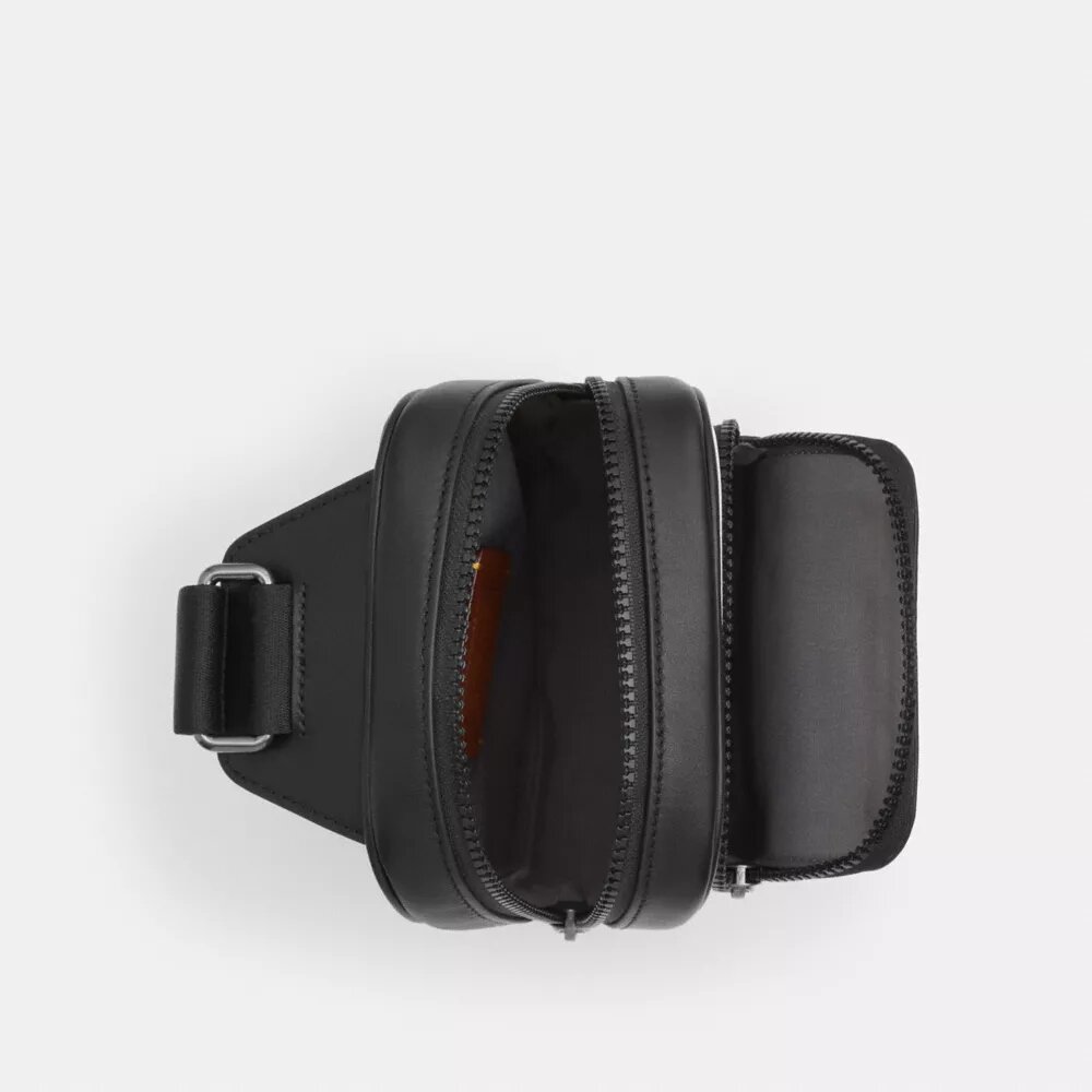Mochila bandolera Racer en Signature Canvas