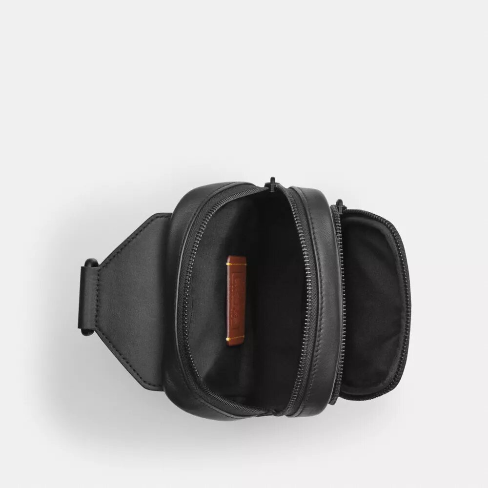 Mochila bandolera Racer en Signature Canvas
