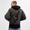 Mochila bandolera Racer en Signature Canvas