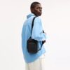 Mochila bandolera Racer en Signature Canvas