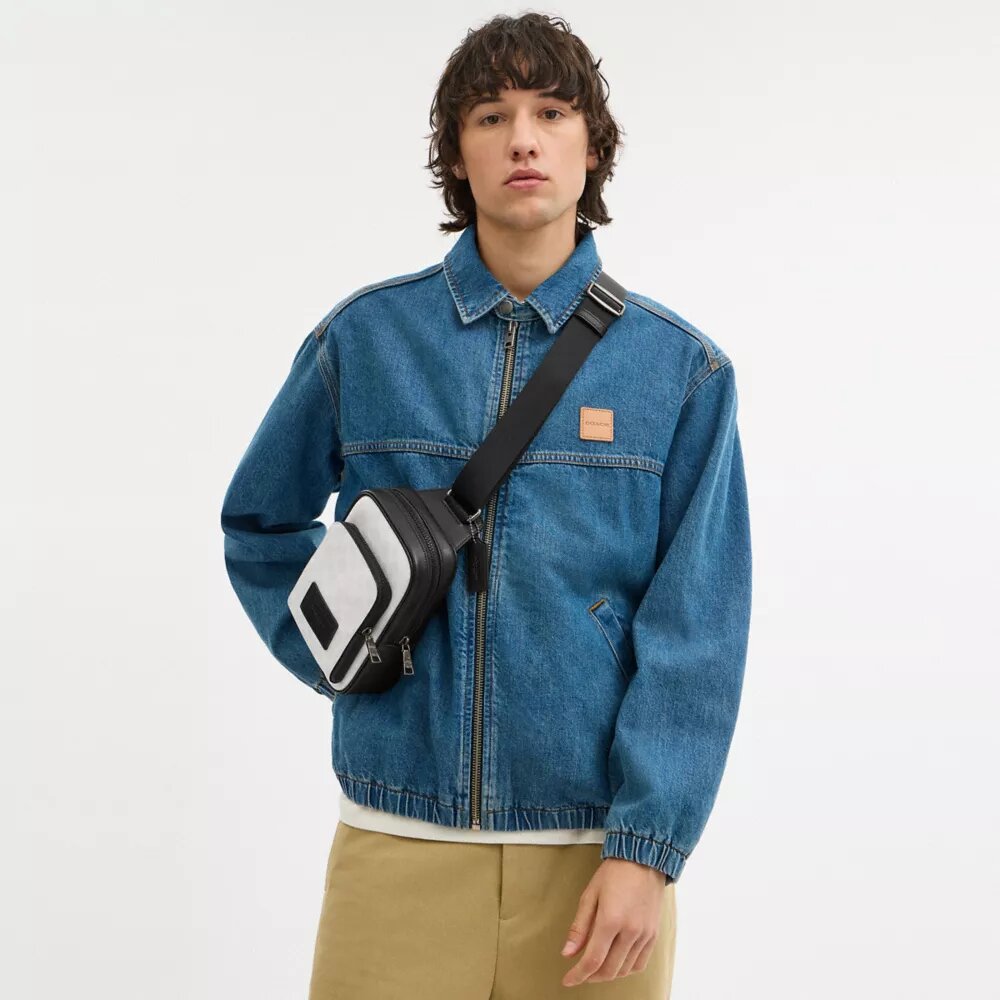 Mochila bandolera Racer en Signature Canvas