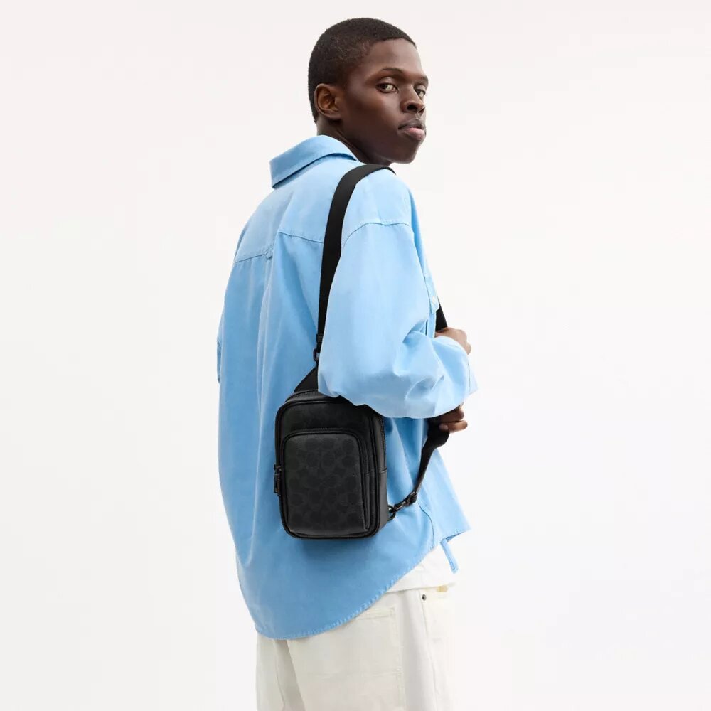 Mochila bandolera Racer en Signature Canvas