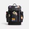 Mochila Hitch en Signature Canvas con parches