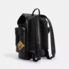 Mochila Hitch en Signature Canvas con parches