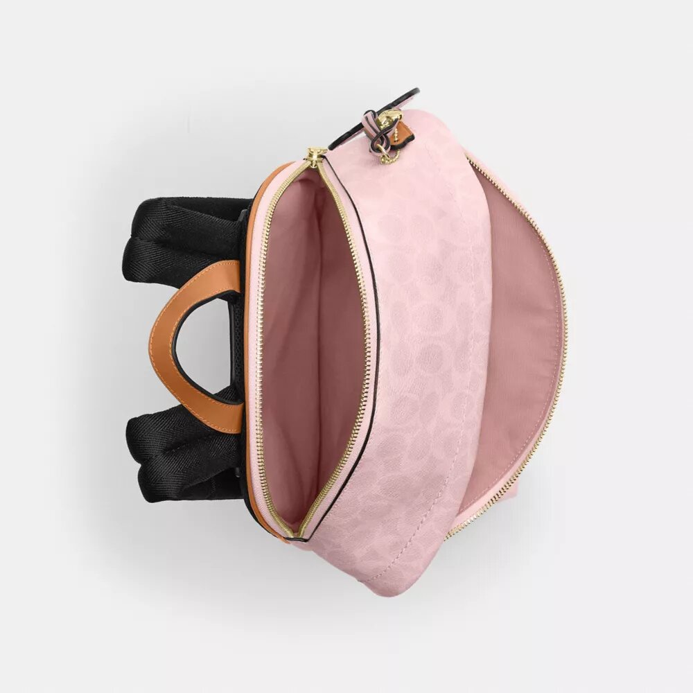 Mochila pequeña Taylor en Signature Canvas con Charms