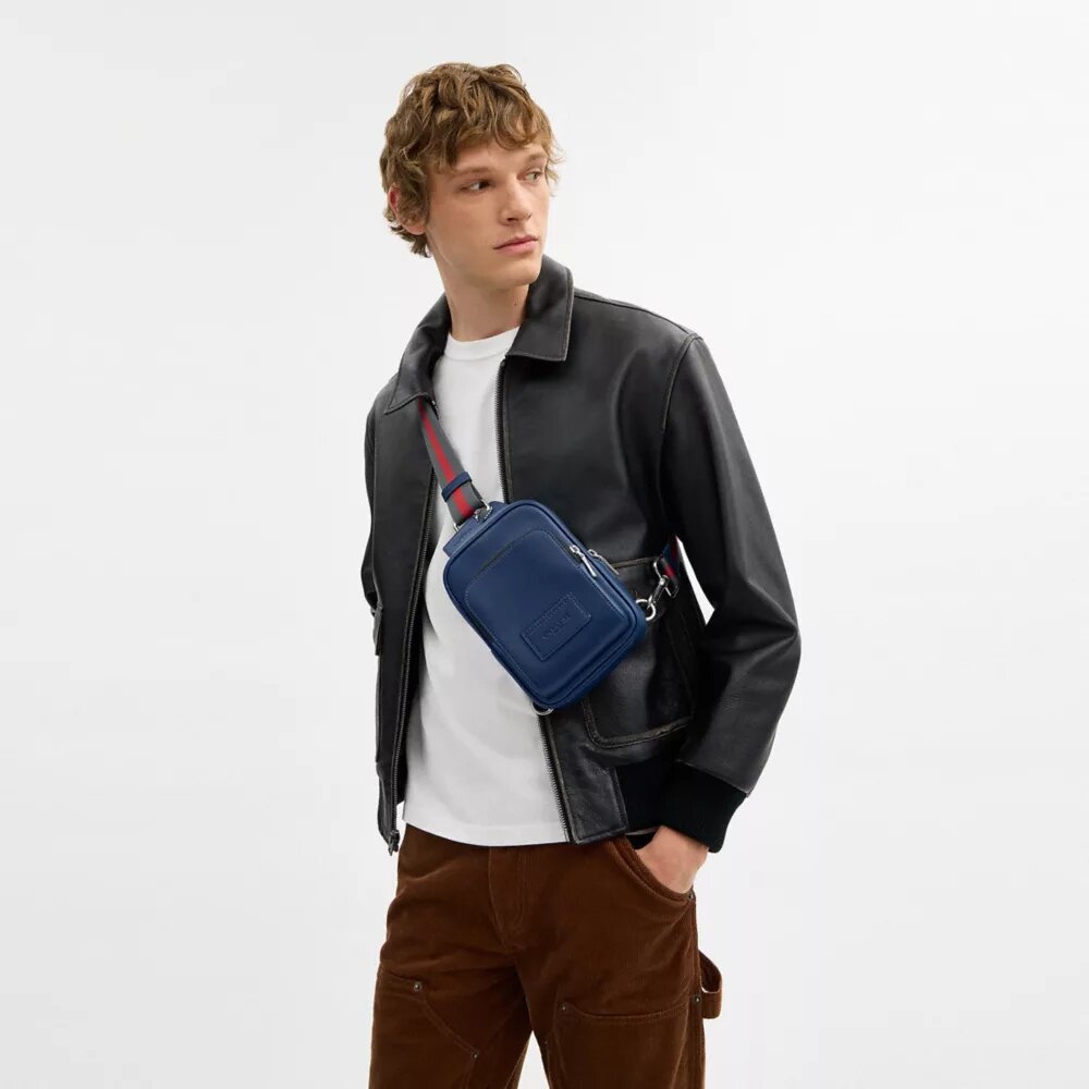 mochila tipo bandolera «Racer» con correas a rayas «Varsity»