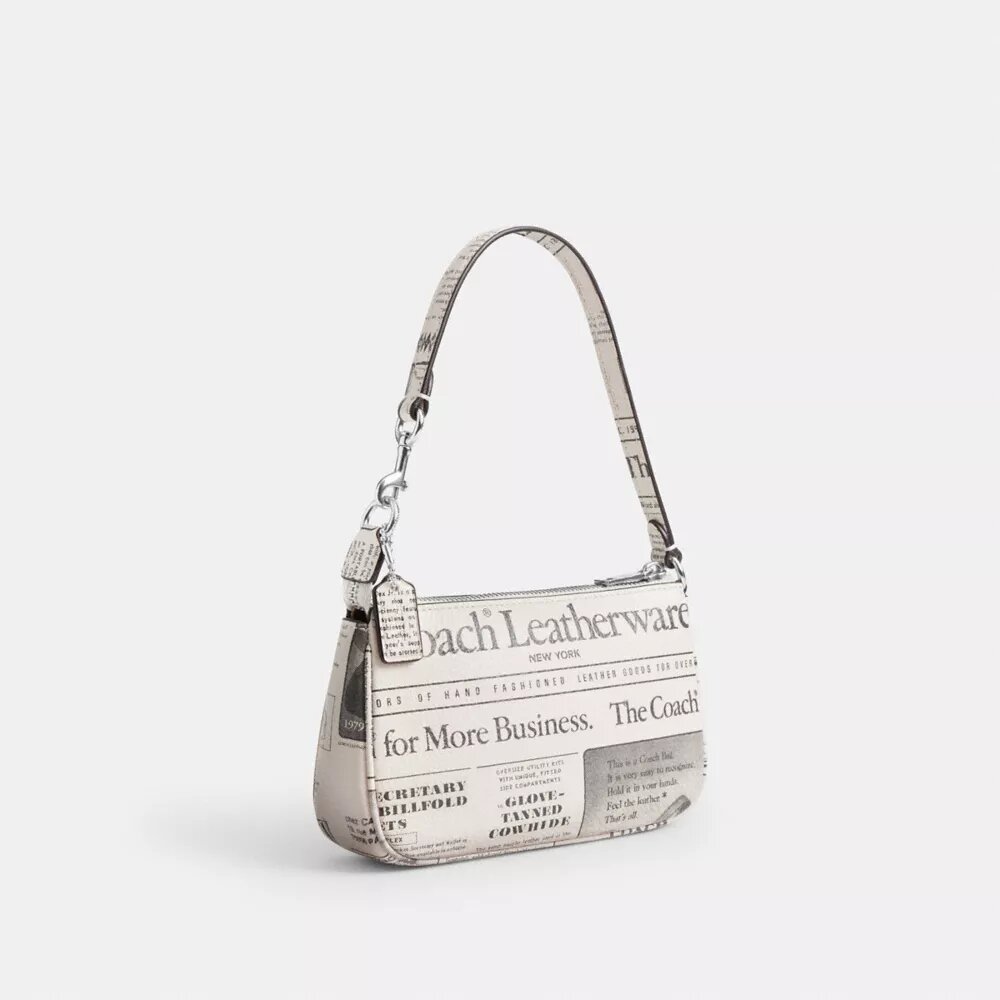 Nolita 19 con estampado de periódico