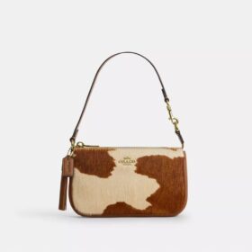 Nolita 19 en piel de becerro con estampado de vaca