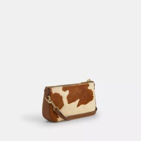 Nolita 19 en piel de becerro con estampado de vaca