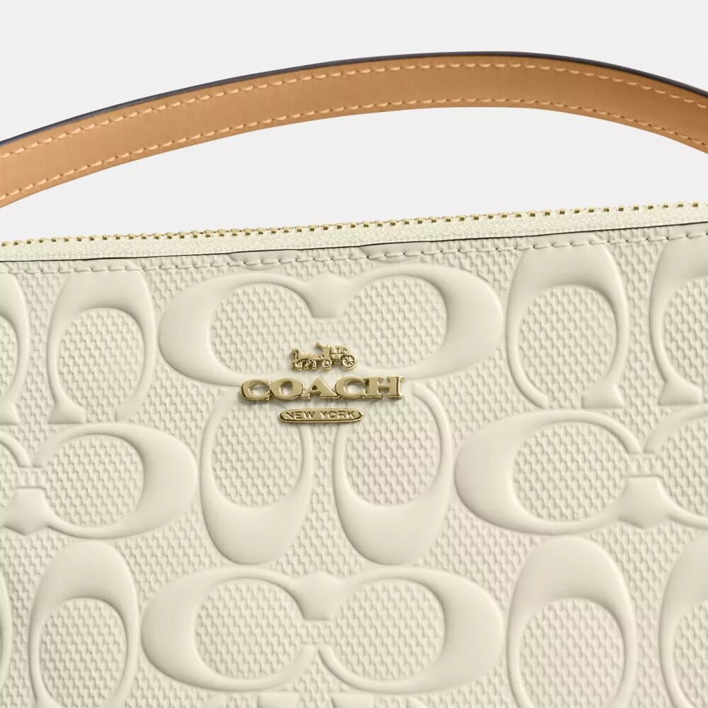 Nolita 19 en piel exclusiva con Charms