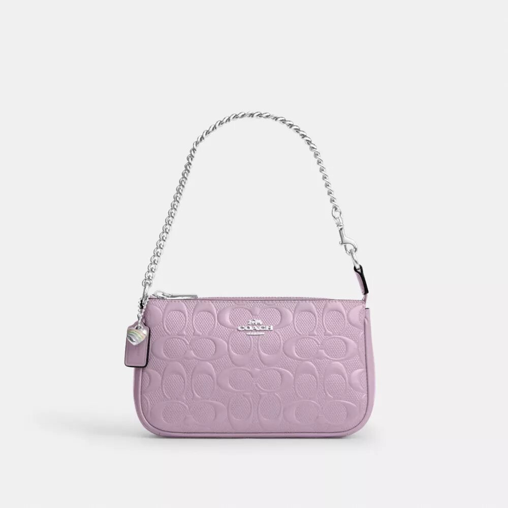 Nolita 19 en piel exclusiva con colgante de corazón