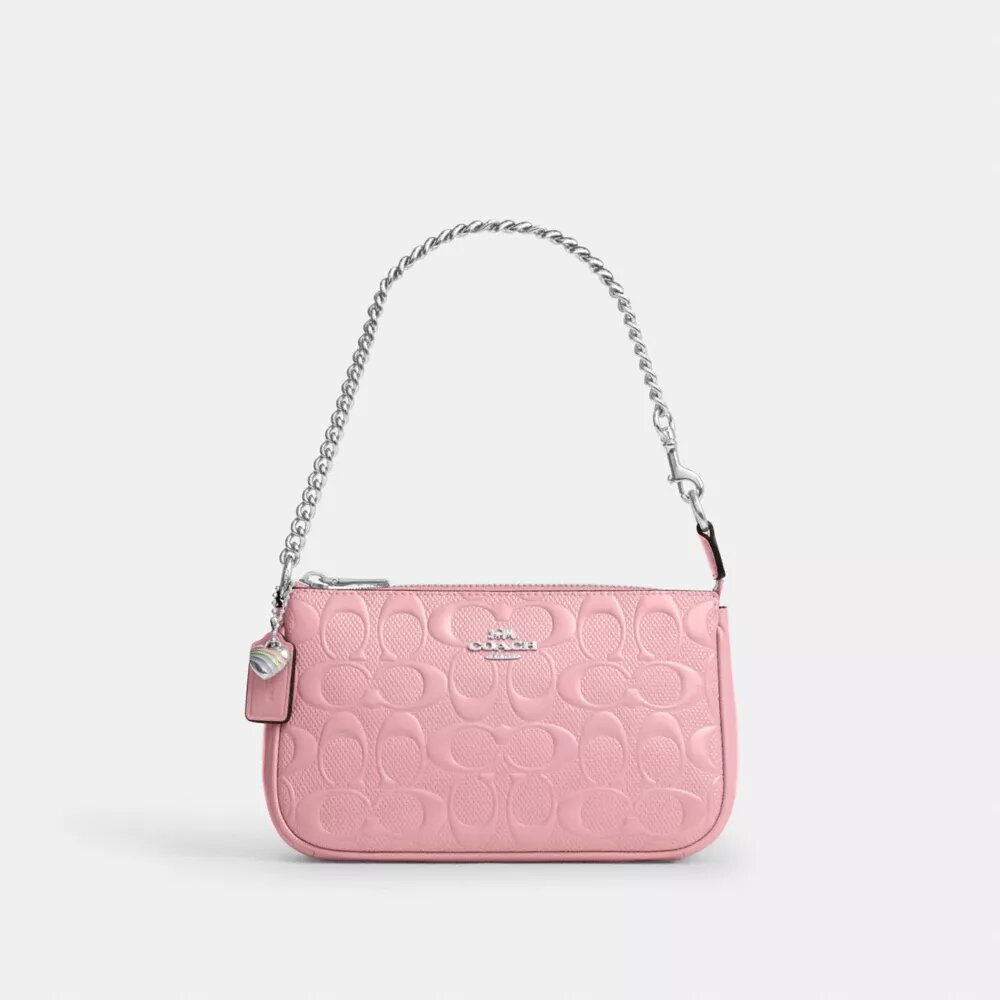 Nolita 19 en piel exclusiva con colgante de corazón