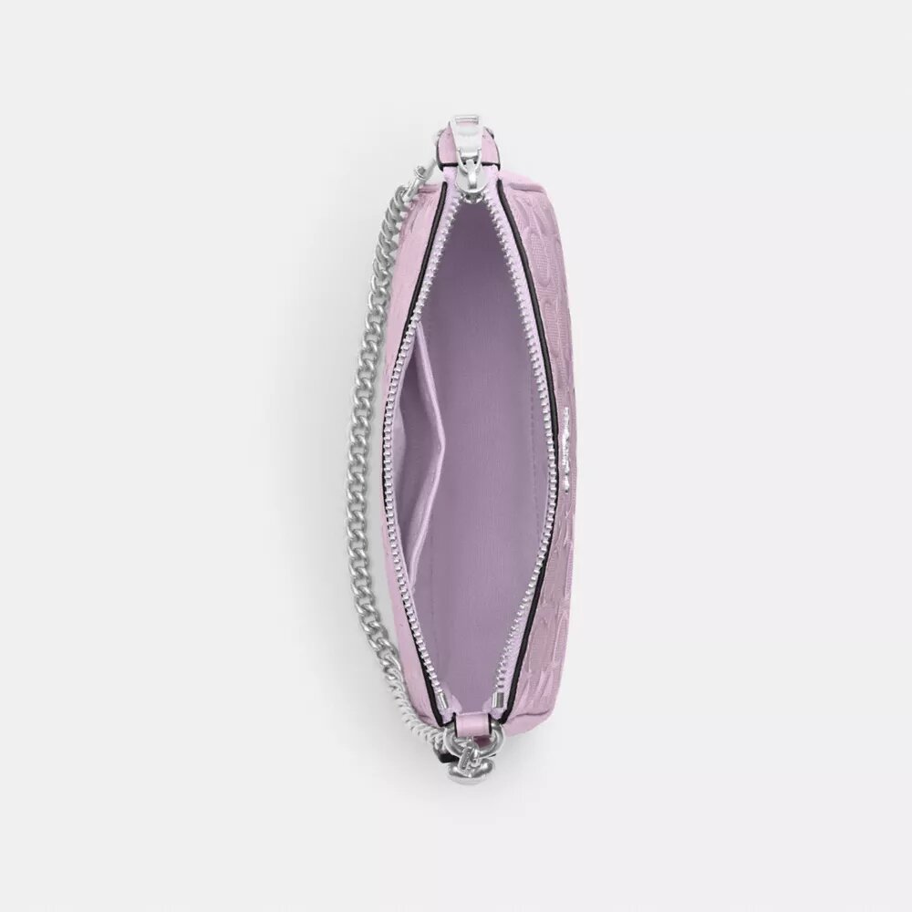 Nolita 19 en piel exclusiva con colgante de corazón