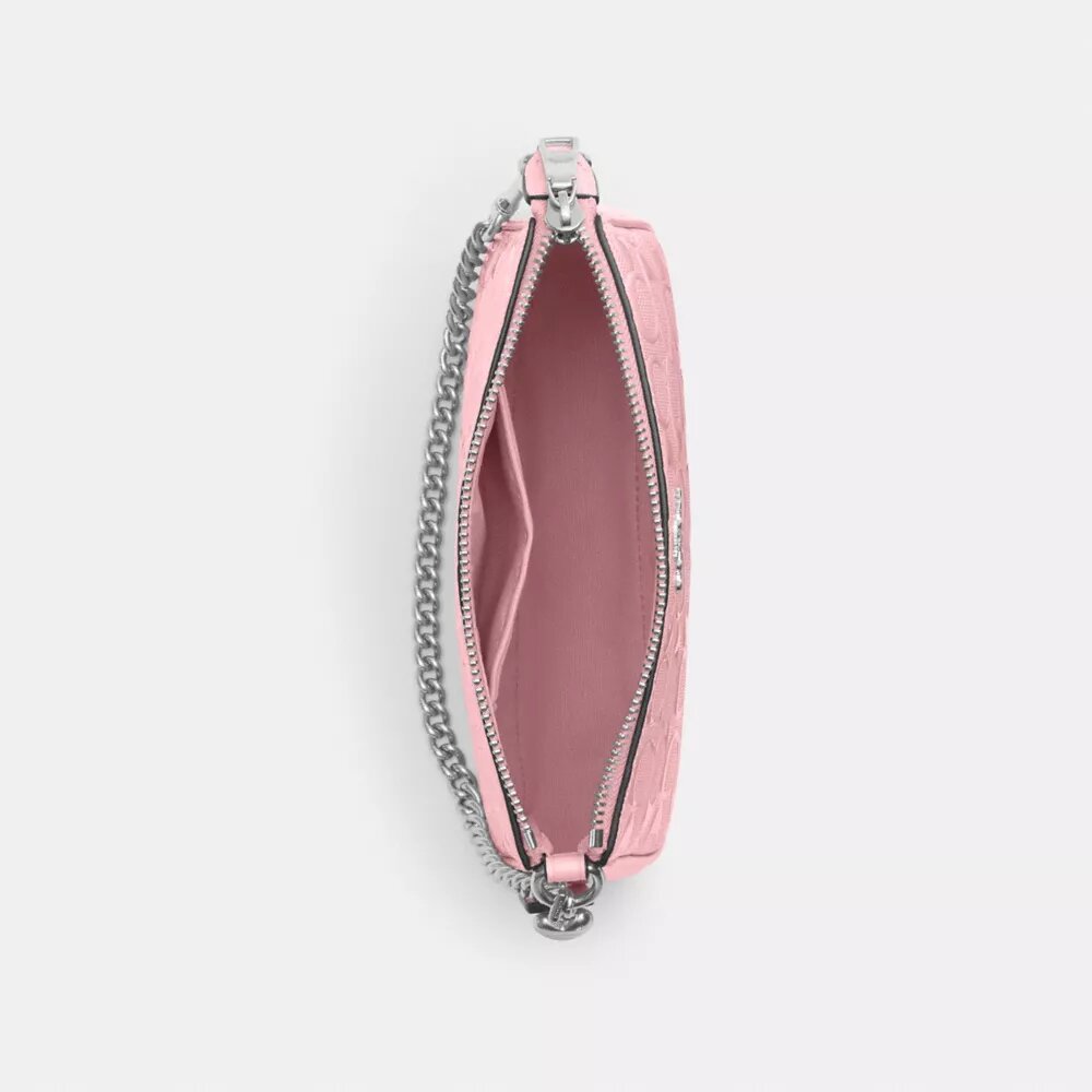 Nolita 19 en piel exclusiva con colgante de corazón