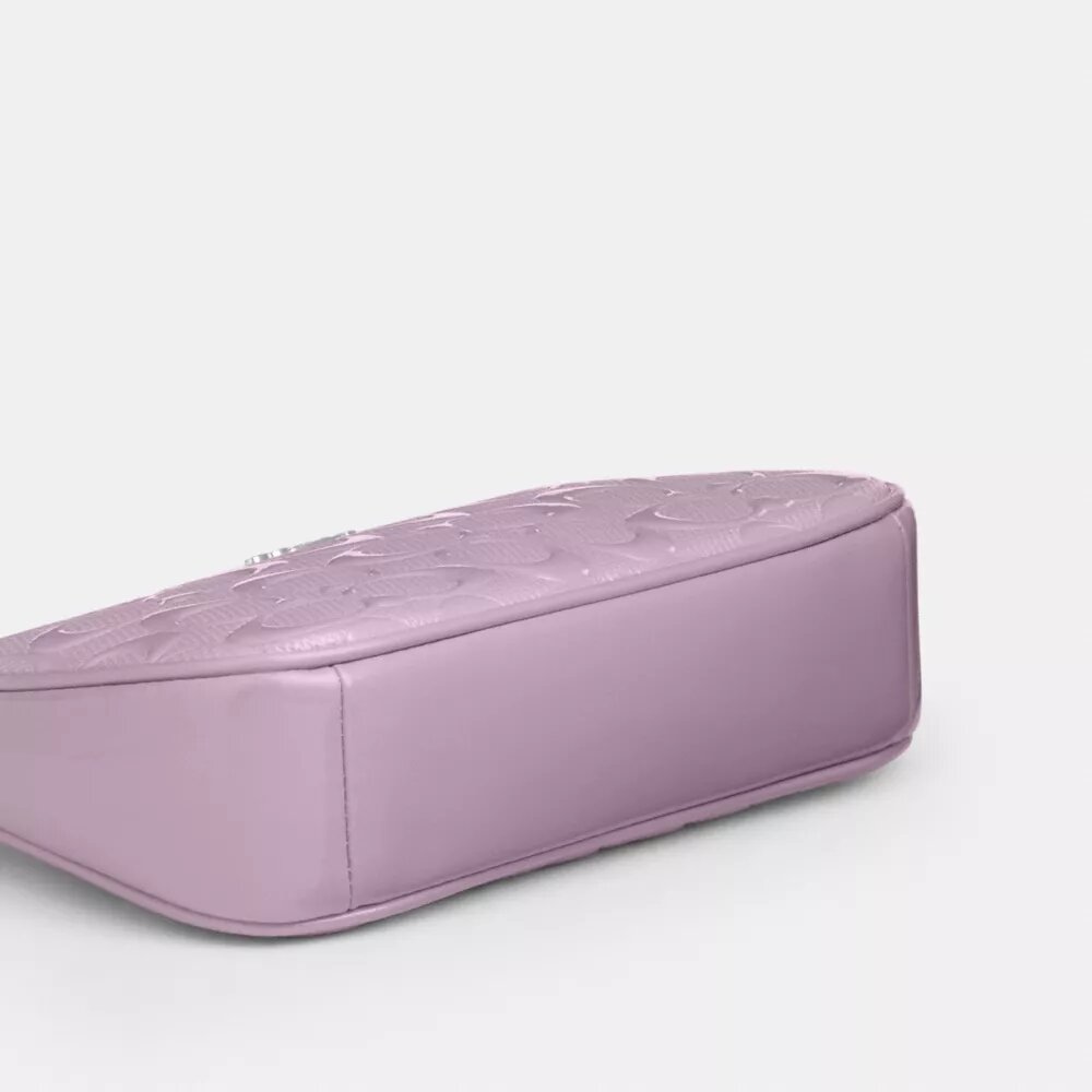 Nolita 19 en piel exclusiva con colgante de corazón