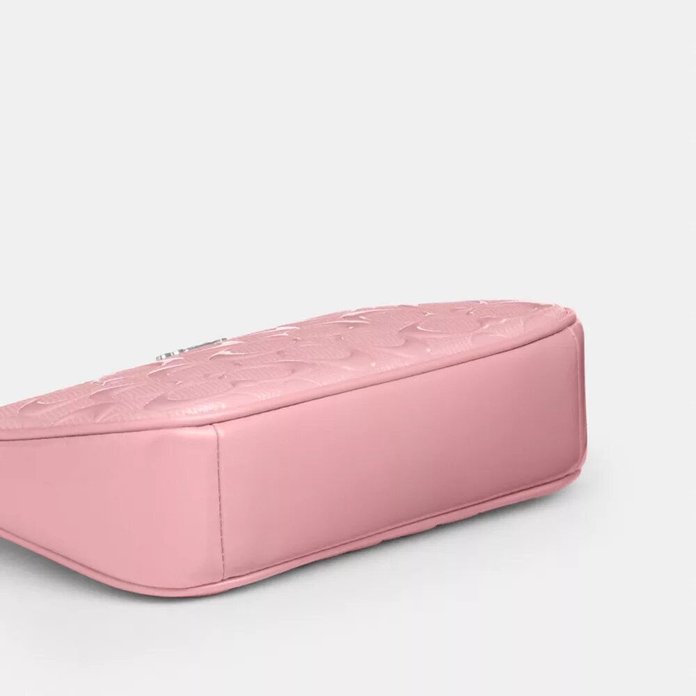 Nolita 19 en piel exclusiva con colgante de corazón