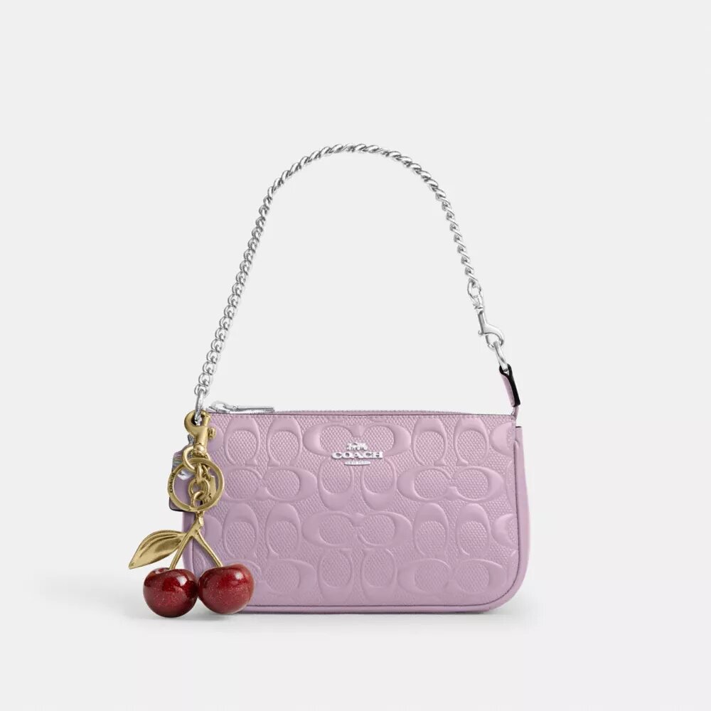 Nolita 19 en piel exclusiva con colgante de corazón