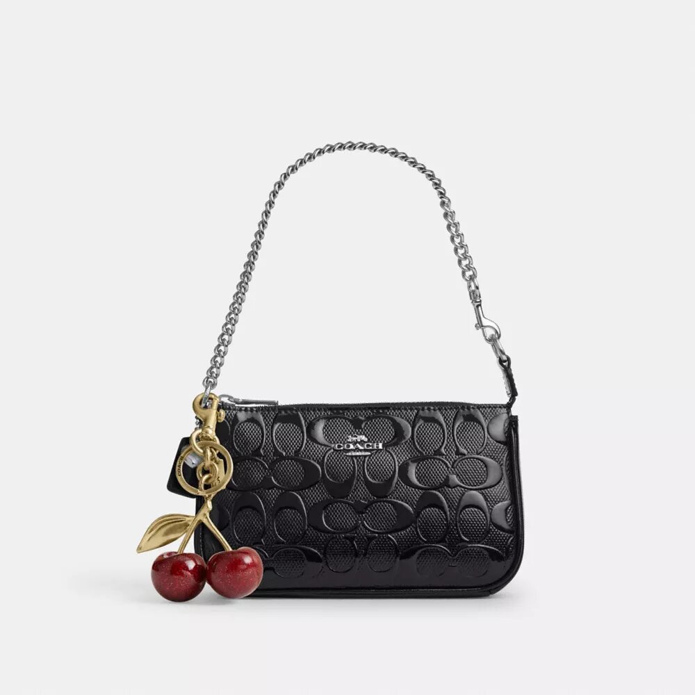 Nolita 19 en piel exclusiva con colgante de corazón