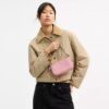 Nolita 19 en piel exclusiva con colgante de corazón