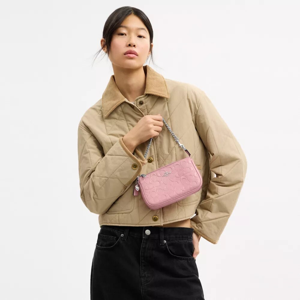 Nolita 19 en piel exclusiva con colgante de corazón