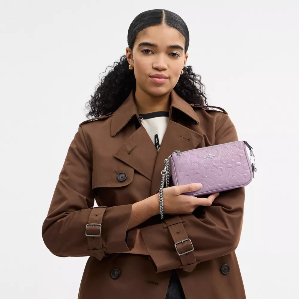 Nolita 19 en piel exclusiva con colgante de corazón