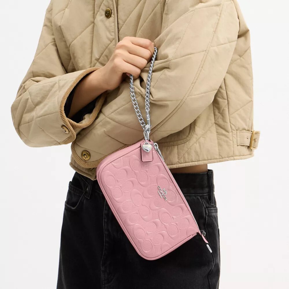 Nolita 19 en piel exclusiva con colgante de corazón