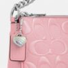 Nolita 19 en piel exclusiva con colgante de corazón