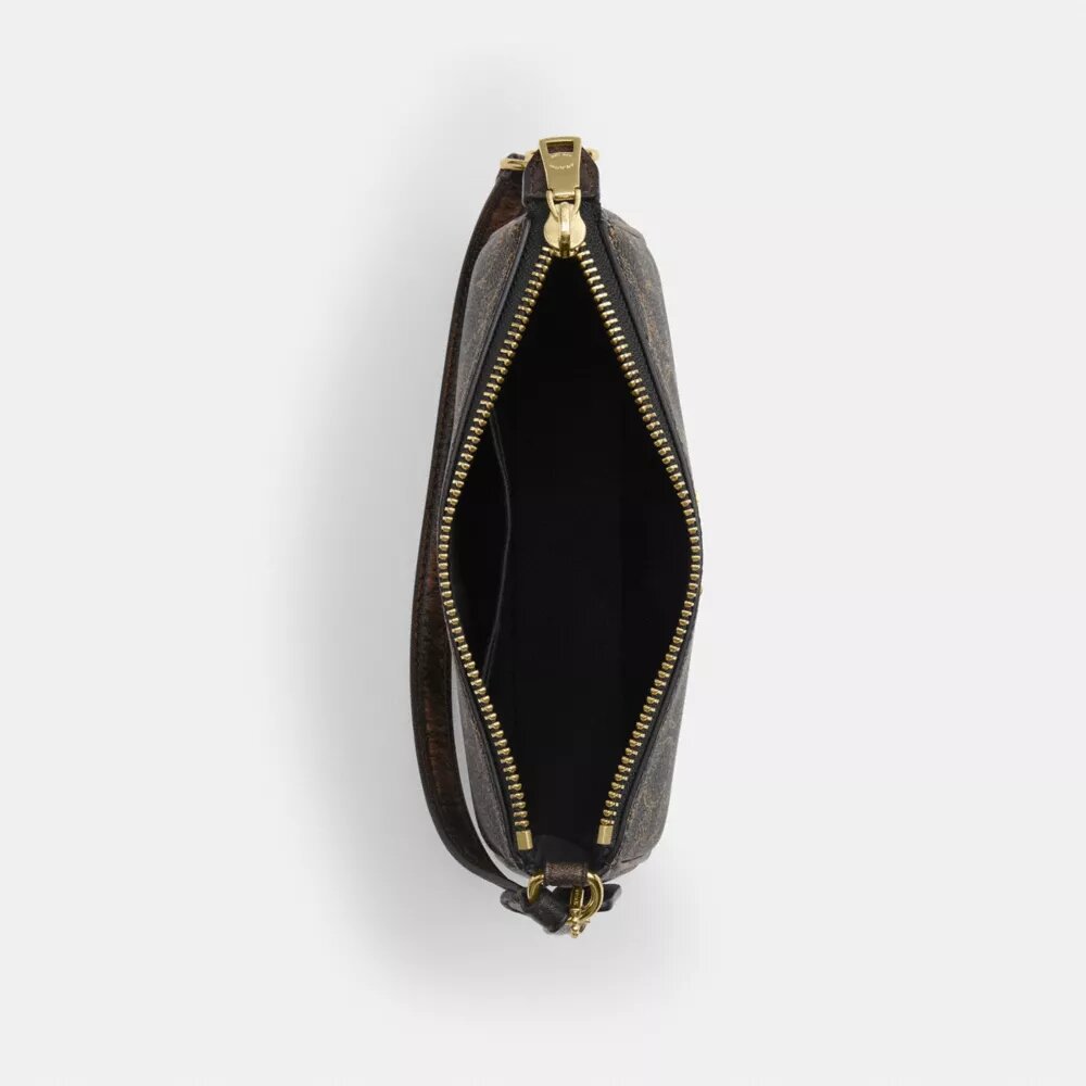 Nolita 19 en Signature Canvas con Charms