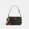 Nolita 19 en Signature Canvas con Charms