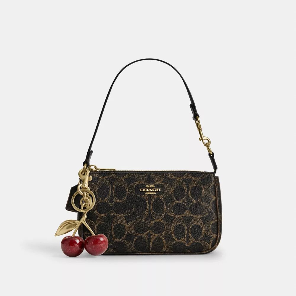 Nolita 19 en Signature Canvas con Charms