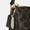 Nolita 19 en Signature Canvas con Charms