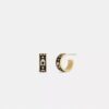 Pendientes Huggie con «C» repetida