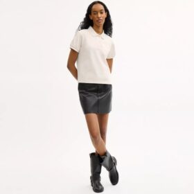 Polos encogidos con el logotipo «Coach Script» en algodón orgánico