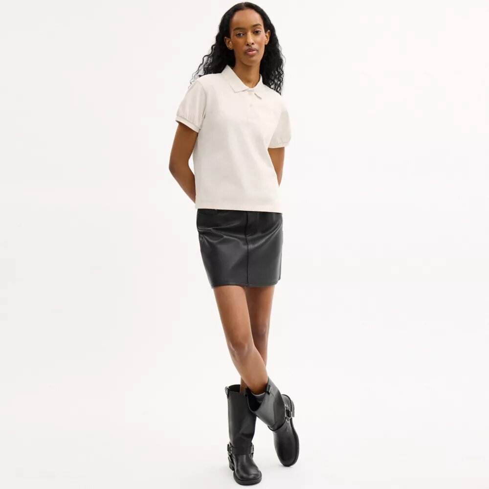 Polos encogidos con el logotipo «Coach Script» en algodón orgánico